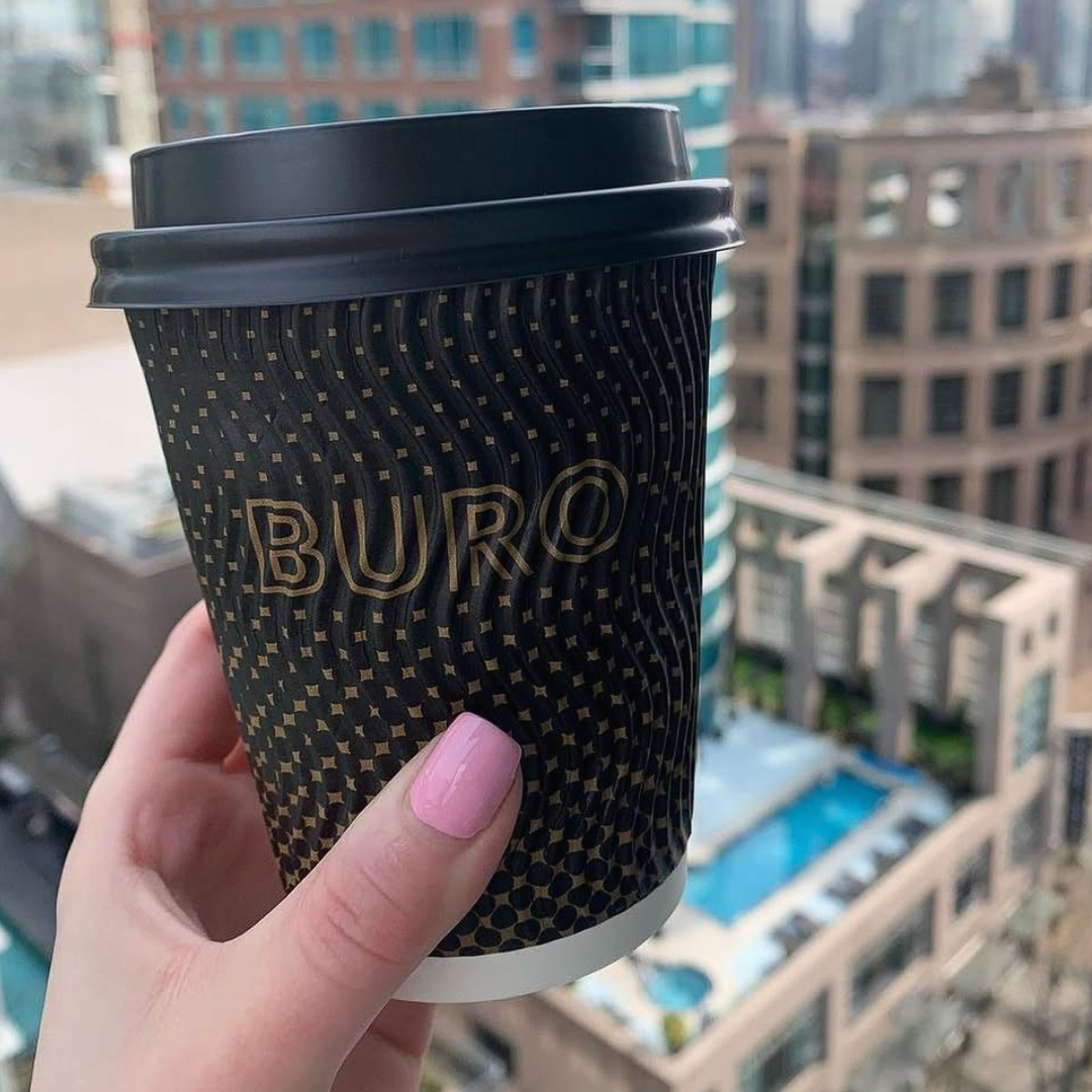 Coffee cup city view